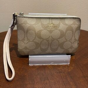 Coach  double zip wristlet  wallet coated canvas  tan/cream, monogram print  GUC